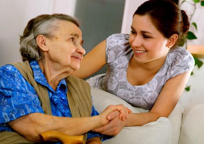 Visiting a senior woman in a nursing home